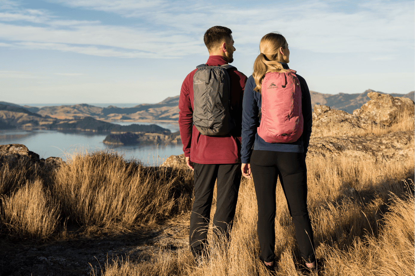 Hiking bag Couple walking with backpack